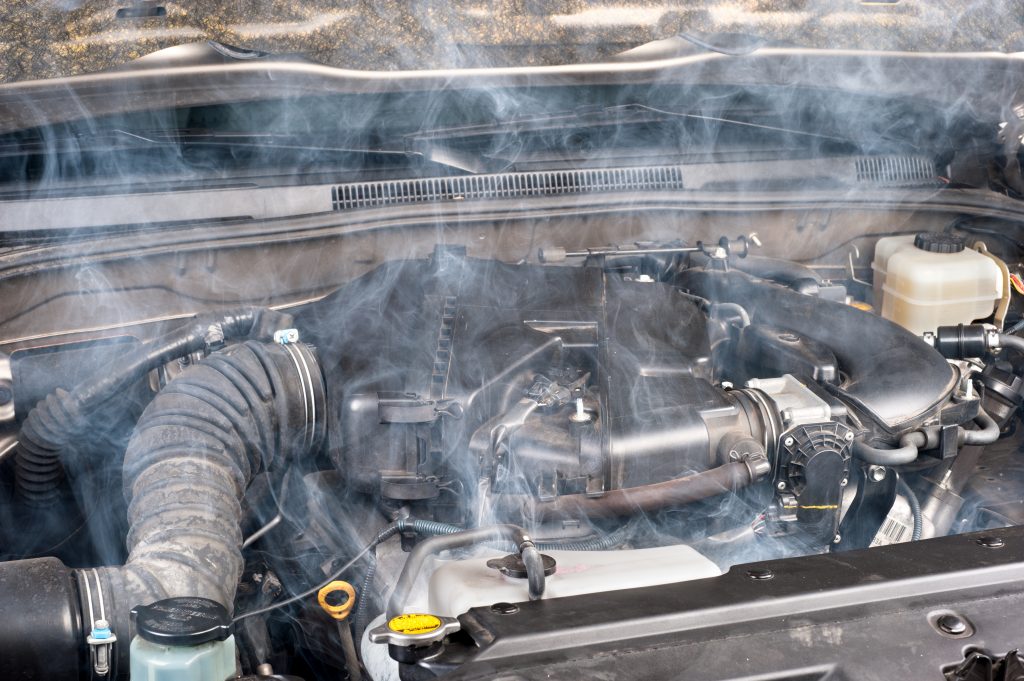 Overheated car engine in the hot temperatures.